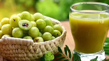 Amla Juice: Vitamin C-rich amla supports stronger and healthier hair.